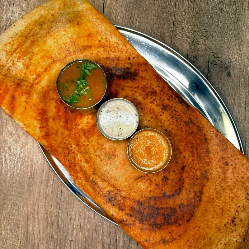 Masala dosa with sambar and coconut chutney